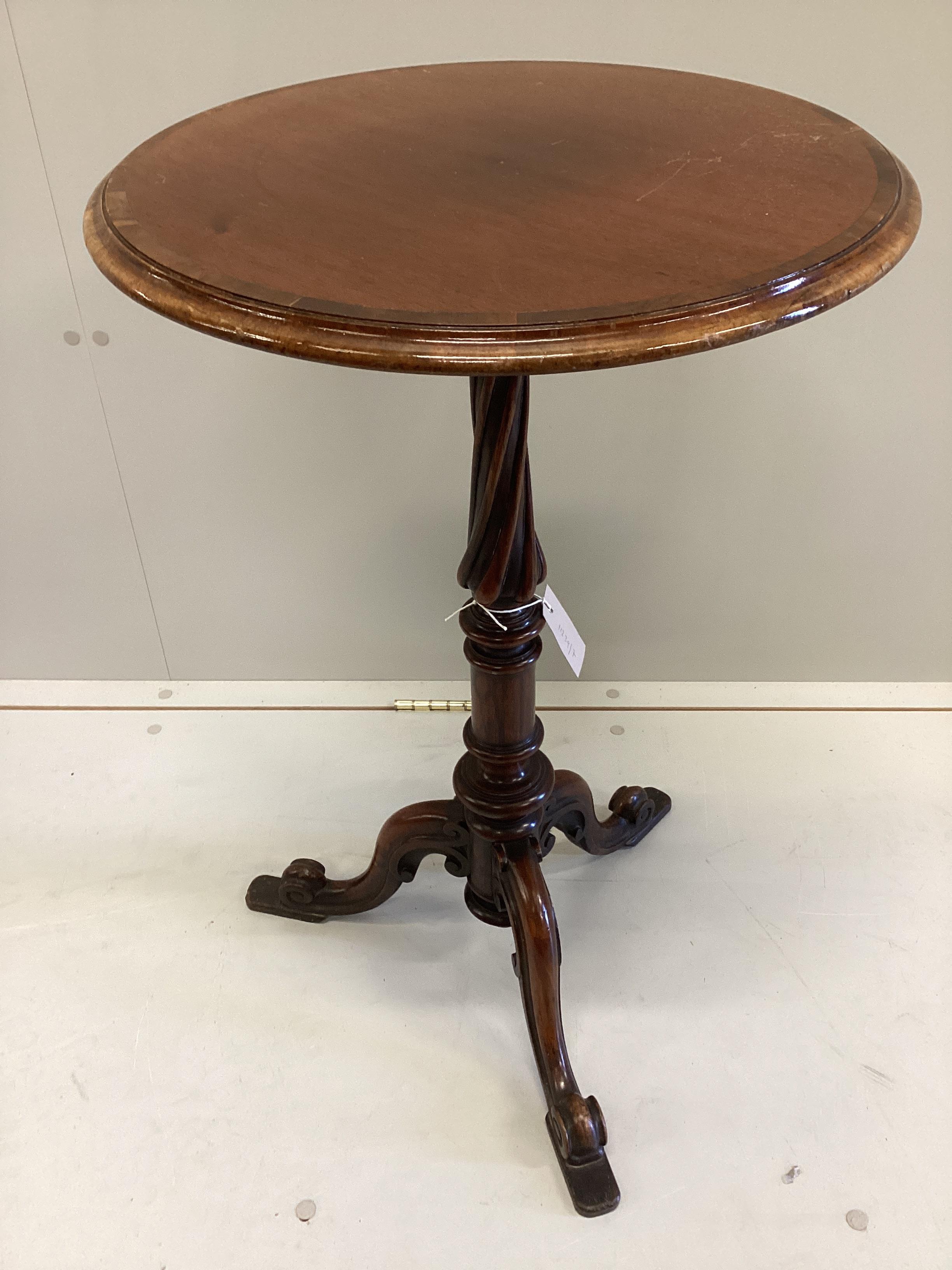 A Victorian circular banded mahogany tripod wine table, labelled T & G Seddon, diameter 46cm, height 74cm